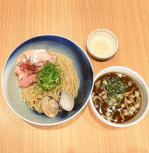 鴨と蛤のカレー南蛮つけそば(36ヶ月熟成パルミジャーノ添え)